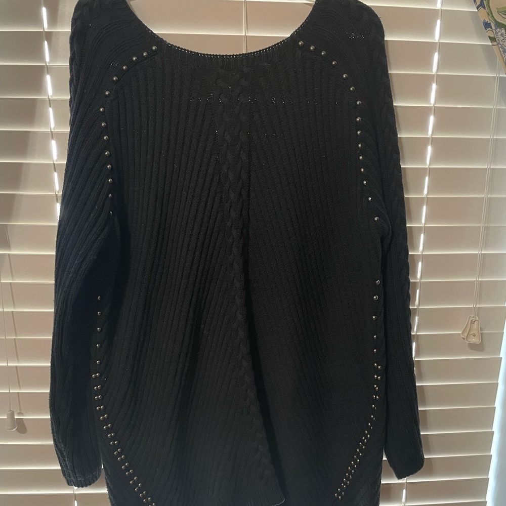 Gray-black knit sweater with stud accents